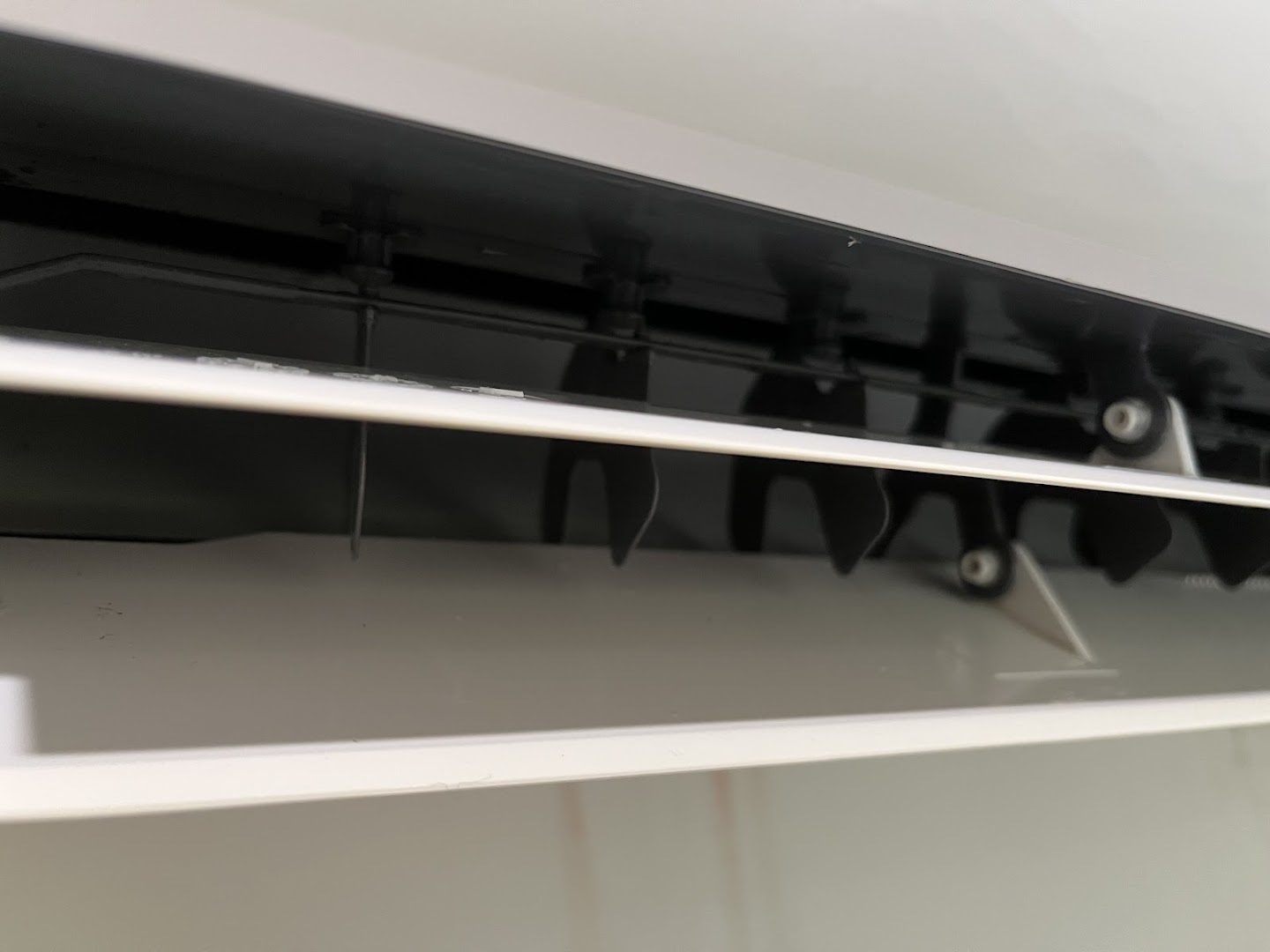 A close view of the vanes inside an air conditioner head