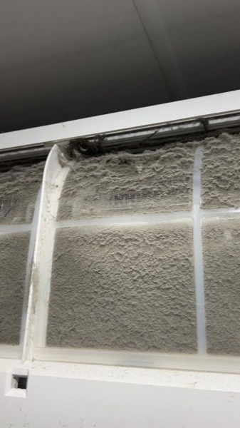 A close view of the dust across an air conditioner vane